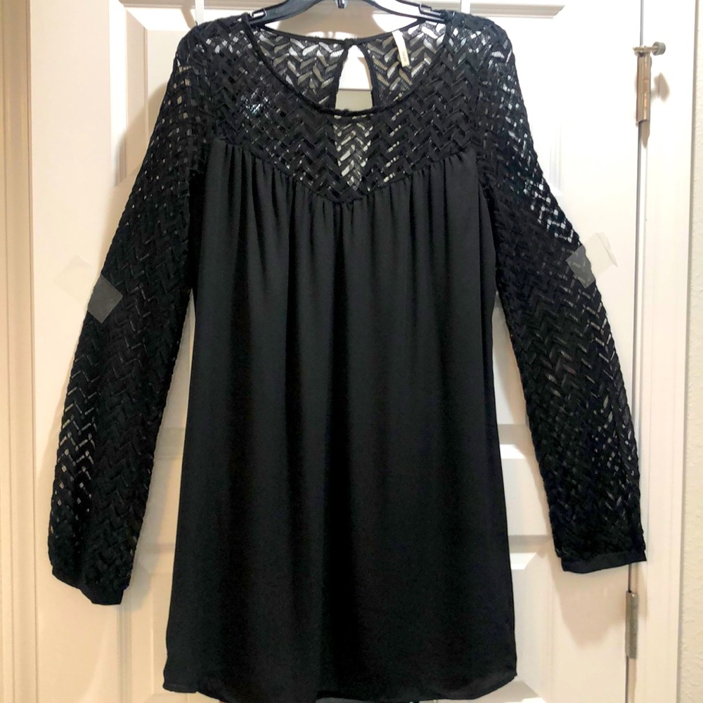 Super cute. Black long sleeve. Cocktail/ fall or winter boutique dress.